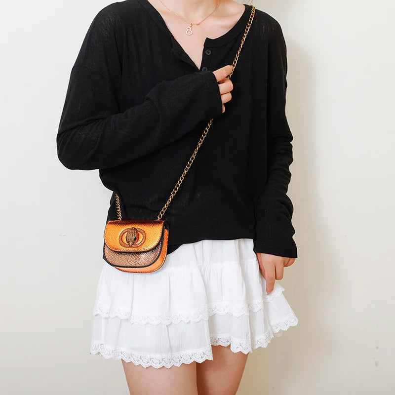 Classic Women Handbag Leather Crossbody Bag worn with a black top and white skirt, showcasing its stylish design.