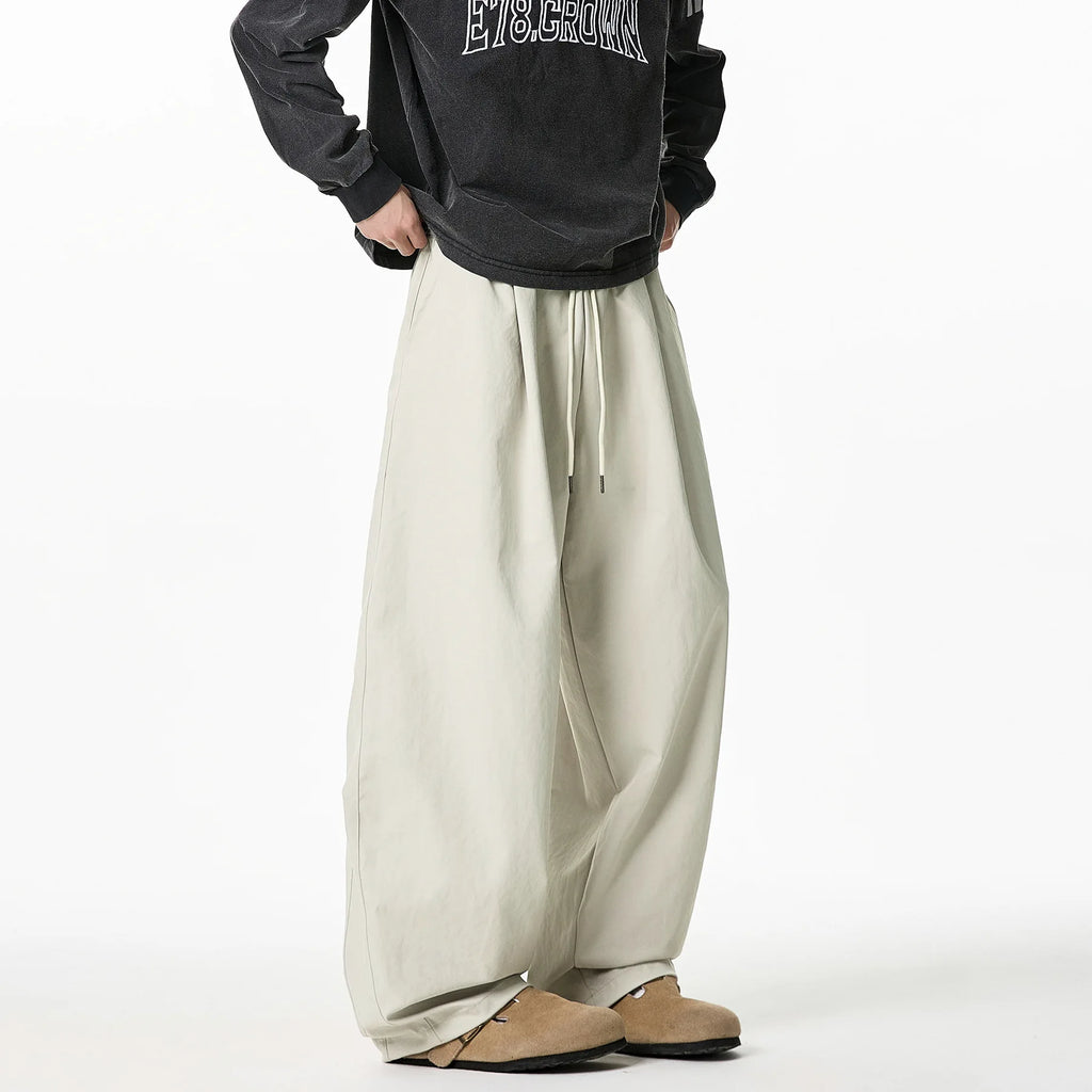2025 Japanese Style Men's Pleated Trousers Loose Fit Wide-Leg Casual Pants Pure Color Micro Flare Spring Fashion Chino Pants