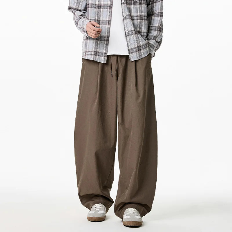 2025 Japanese Style Men's Pleated Trousers Loose Fit Wide-Leg Casual Pants Pure Color Micro Flare Spring Fashion Chino Pants
